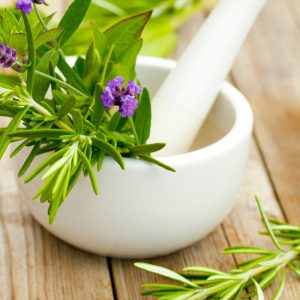 Closeup shot of purple lavender with mortar and pestle – beauty treatment concept A closeup shot of purple lavender with mortar and pestle - beauty treatment concept